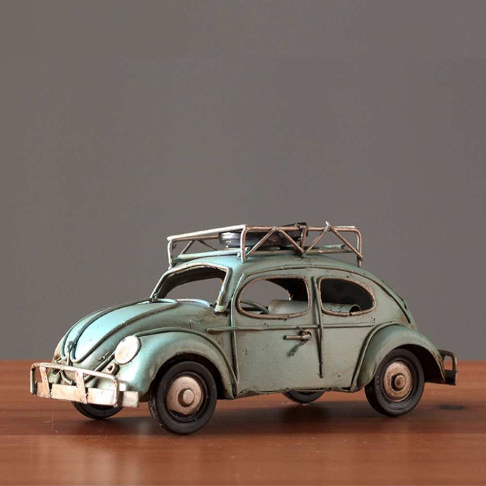 Vintage Diecast Blue Beetle with Spare Wheels on Roof Rack