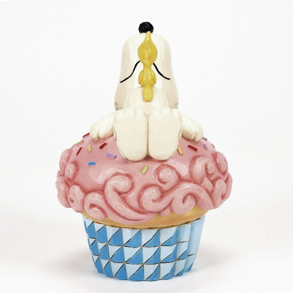 Peanuts by Jim Shore Snoopy Laying on Cupcake