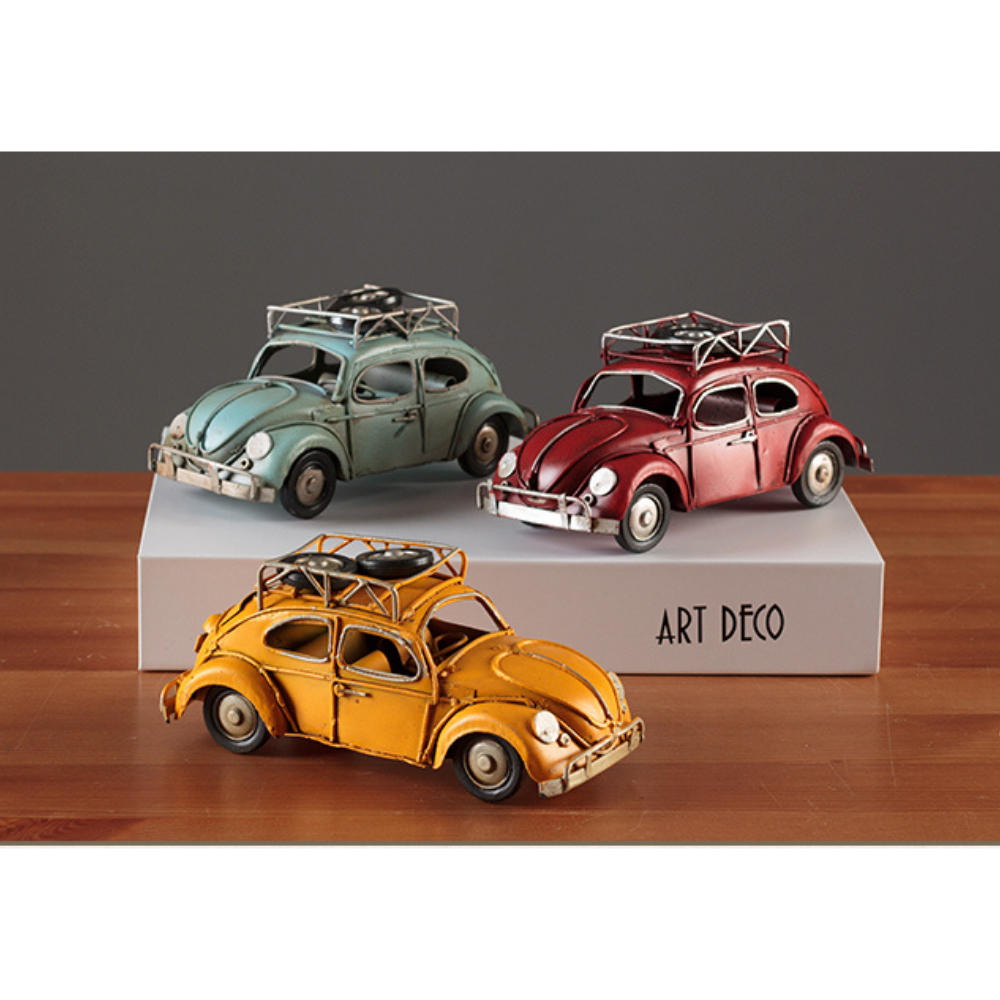 Vintage Diecast Blue Beetle with Spare Wheels on Roof Rack